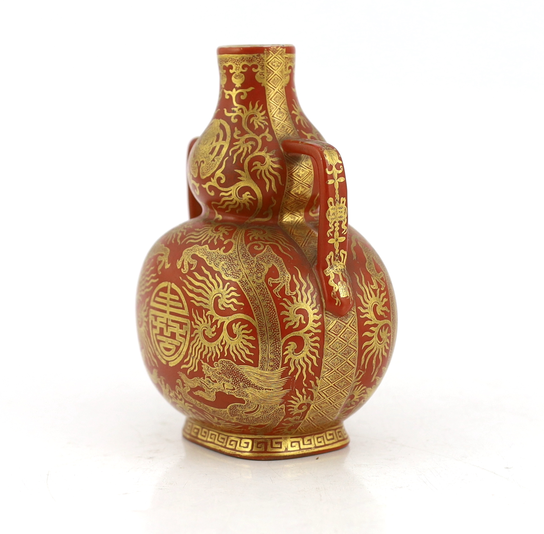 A Chinese gilt decorated coral ground ‘dragon’ vase, 20th century
